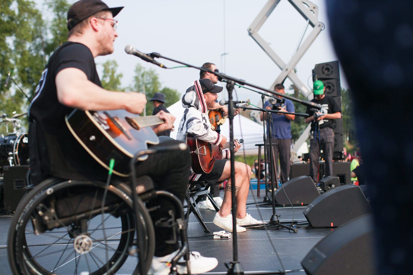 Portugal. The Man members Eric Howk, John Gourley, and Zack Carothers performing at the Save Our State rally, Anchorage, Alaska, July 2019